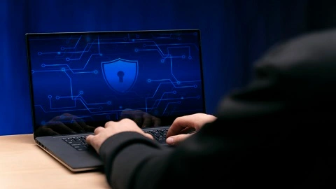 cybersecurity-threat-prevention-close-up-programmer-typing-keyboard.webp